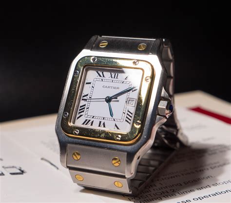 cartier tank or santos